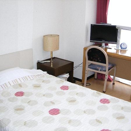 Business Inn Grandeur Фучу Екстериор снимка