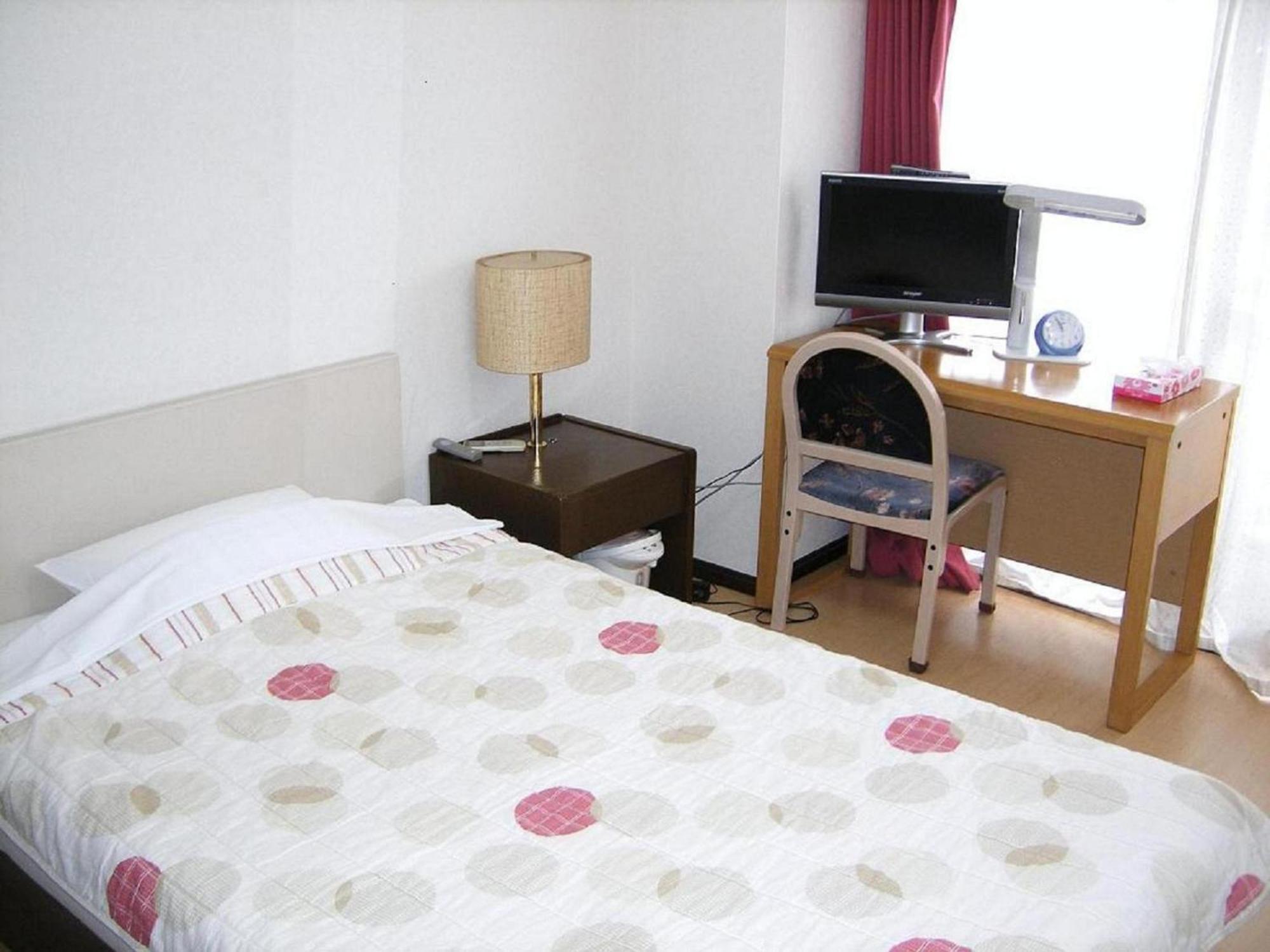 Business Inn Grandeur Фучу Екстериор снимка