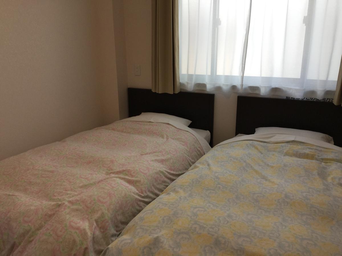 Business Inn Grandeur Фучу Екстериор снимка