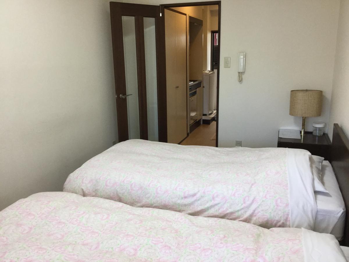 Business Inn Grandeur Фучу Екстериор снимка