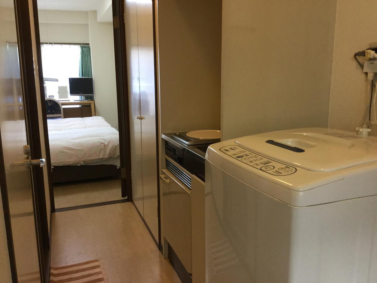 Business Inn Grandeur Фучу Екстериор снимка